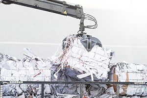 Image of a paper baler in use